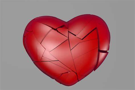 a glass heart with cracks