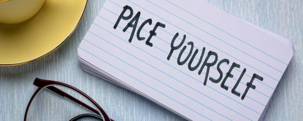 the words "pace yourself" in black letters on a white index card