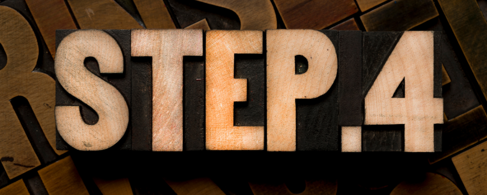 the words step 4 spelled out with wooden letters