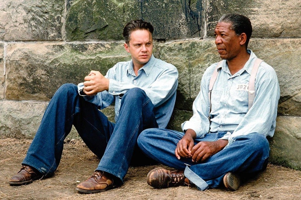 Andy and Red from the Shawshank Redemption sitting beside one another