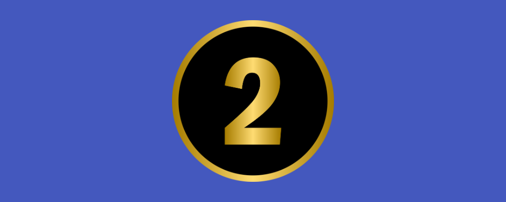 a gold number 2 in a black circle on a blue background