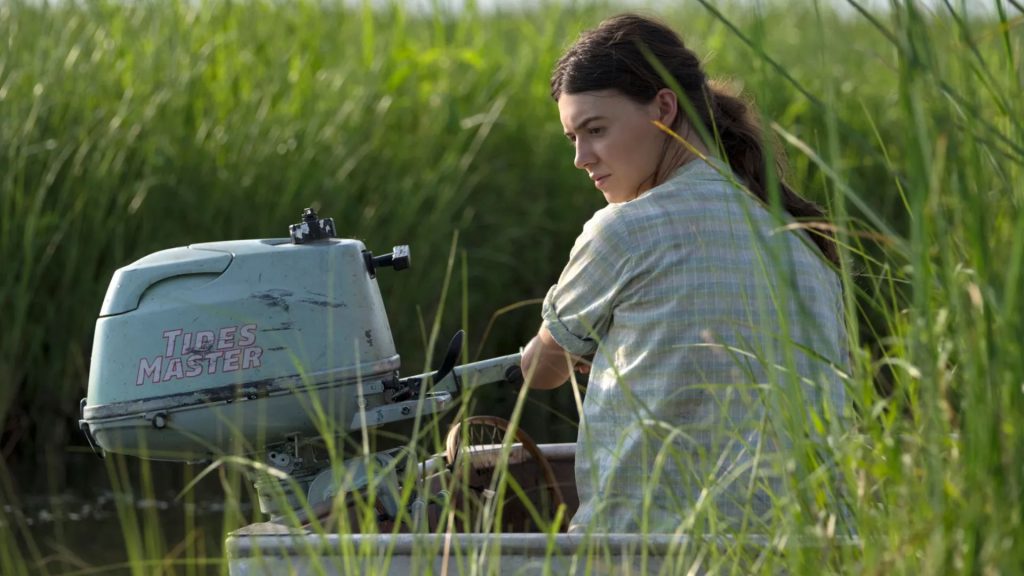 A boat on a marsh from the film version of Where The Crawdads Sing